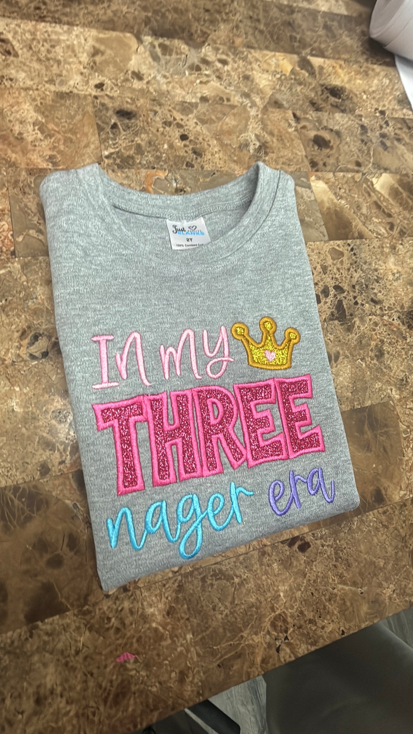 In my Three nager era shirt